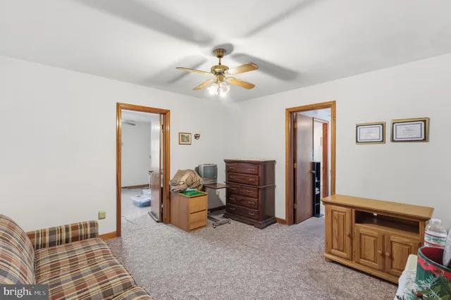a kitchen with a stove a sink and a refrigerator