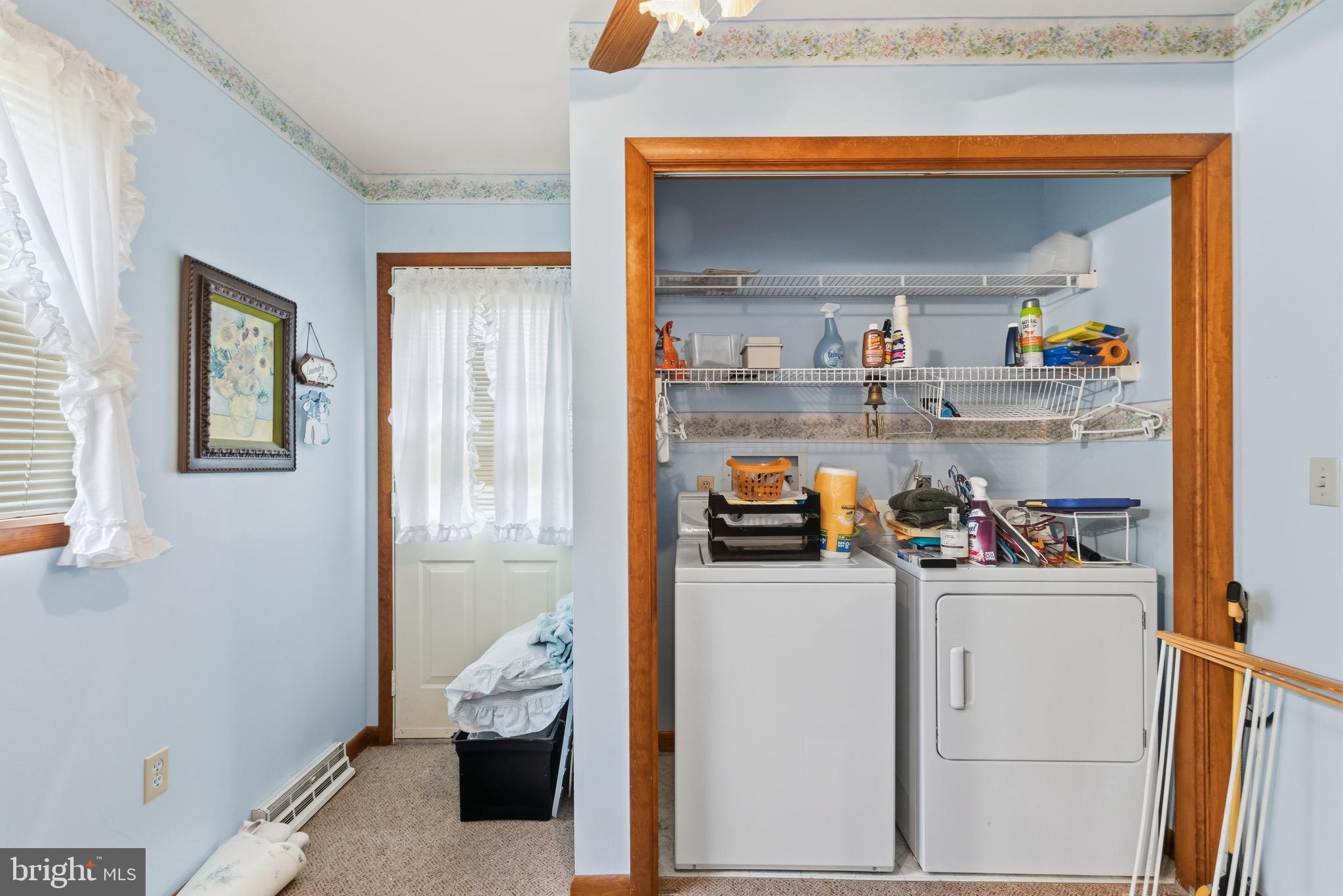 961 Canterbury Road Milford, DE 19963 - Photo 15 of 27 a room with a refrigerator and cabinets