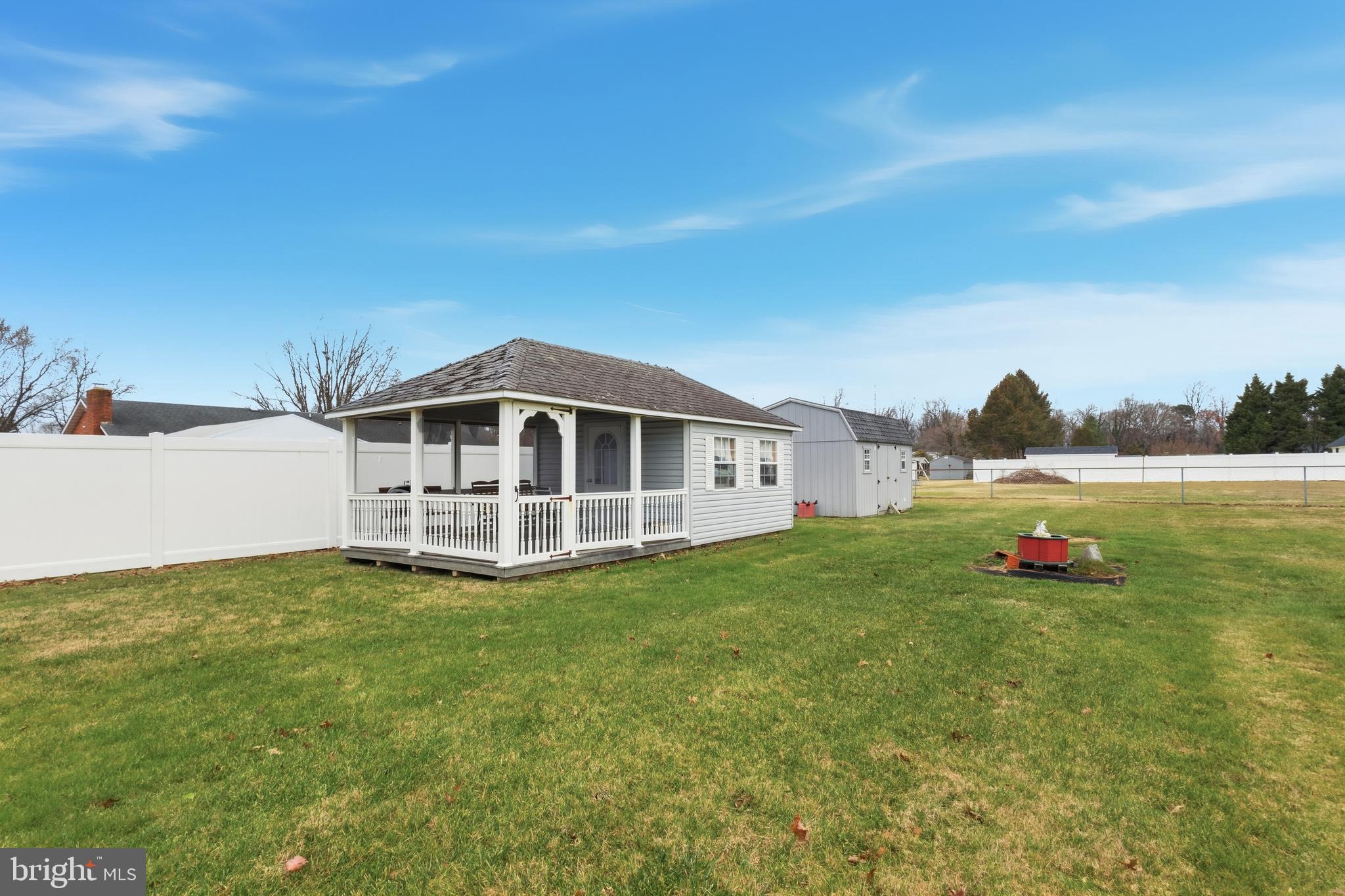 961 Canterbury Road Milford, DE 19963 - Photo 25 of 27 a white house with a big yard and large tree