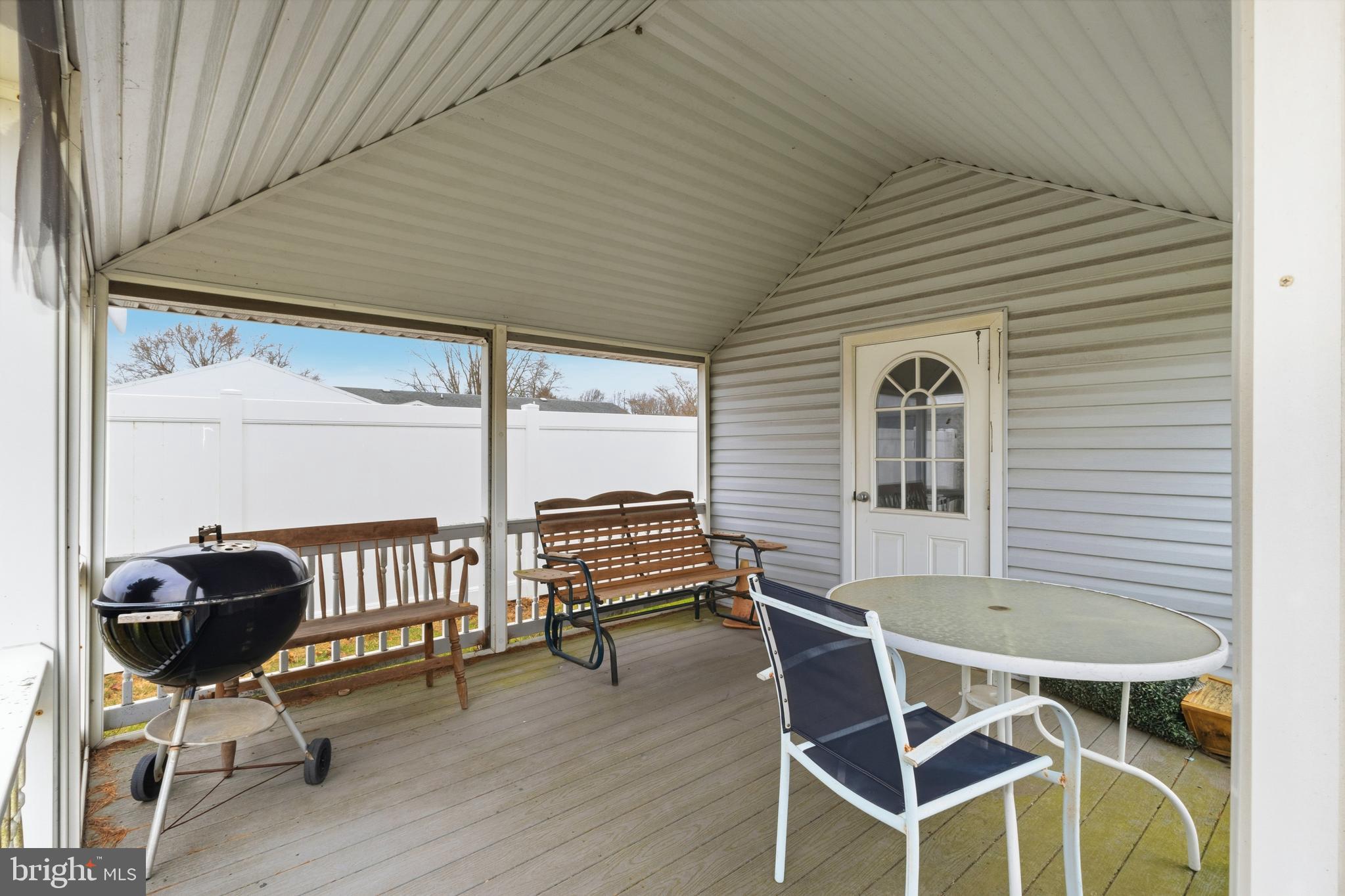 961 Canterbury Road Milford, DE 19963 - Photo 26 of 27 a patio with table and chairs