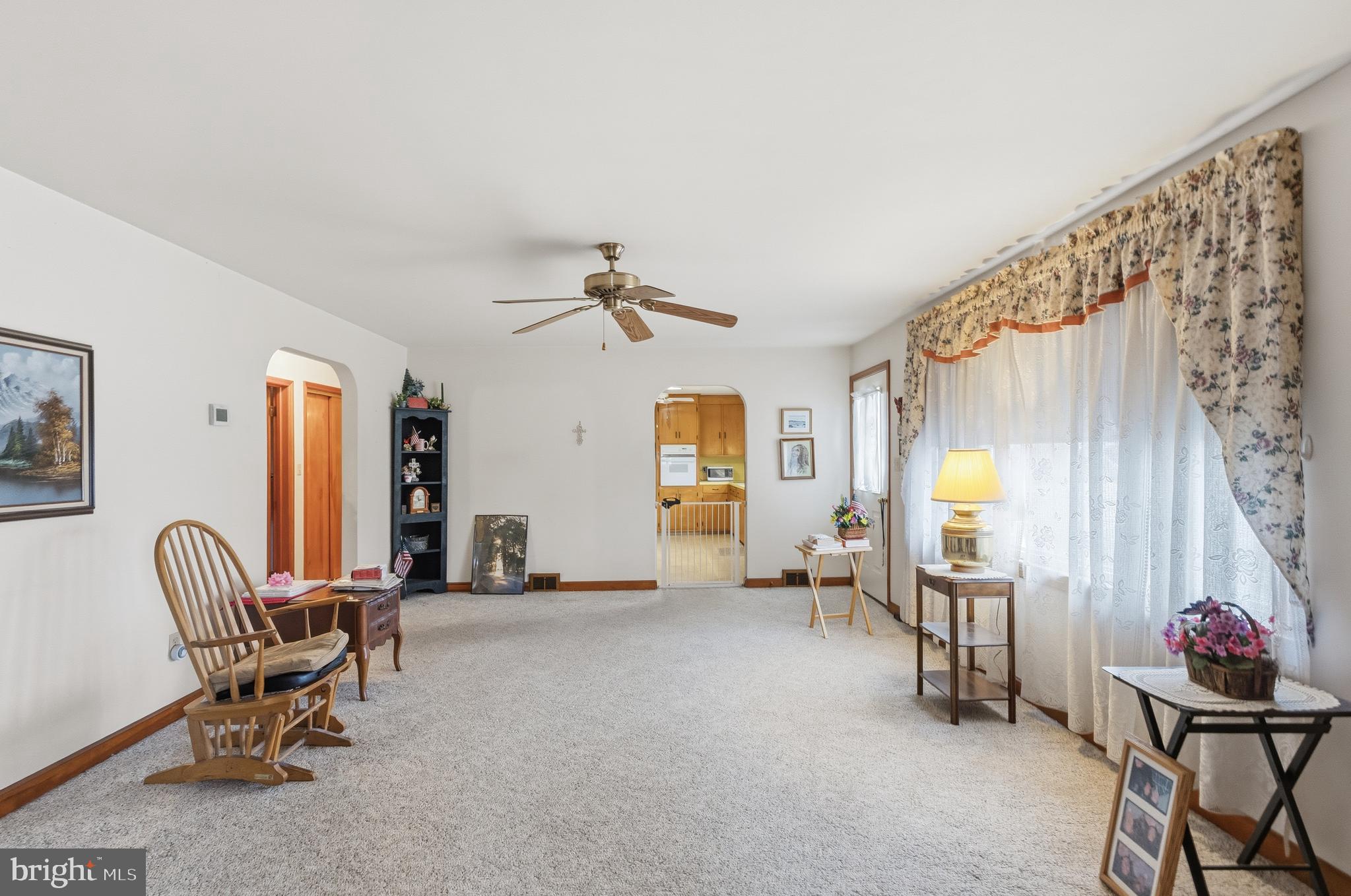 961 Canterbury Road Milford, DE 19963 - Photo 8 of 27 a living room with furniture and a window