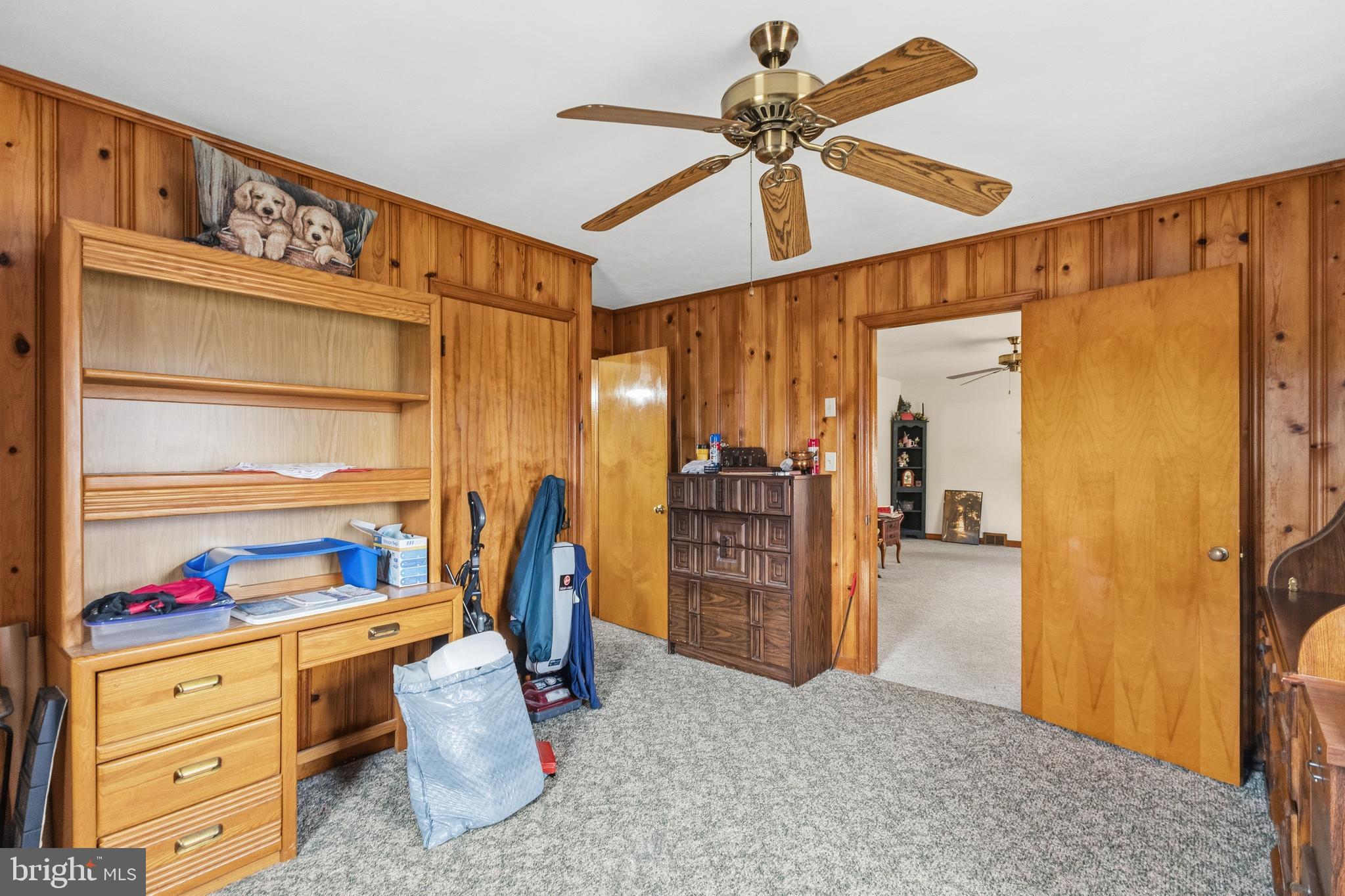 961 Canterbury Road Milford, DE 19963 - Photo 10 of 27 a view of walk in closet with clothes and shoes