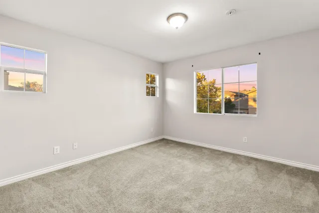 an empty room with windows