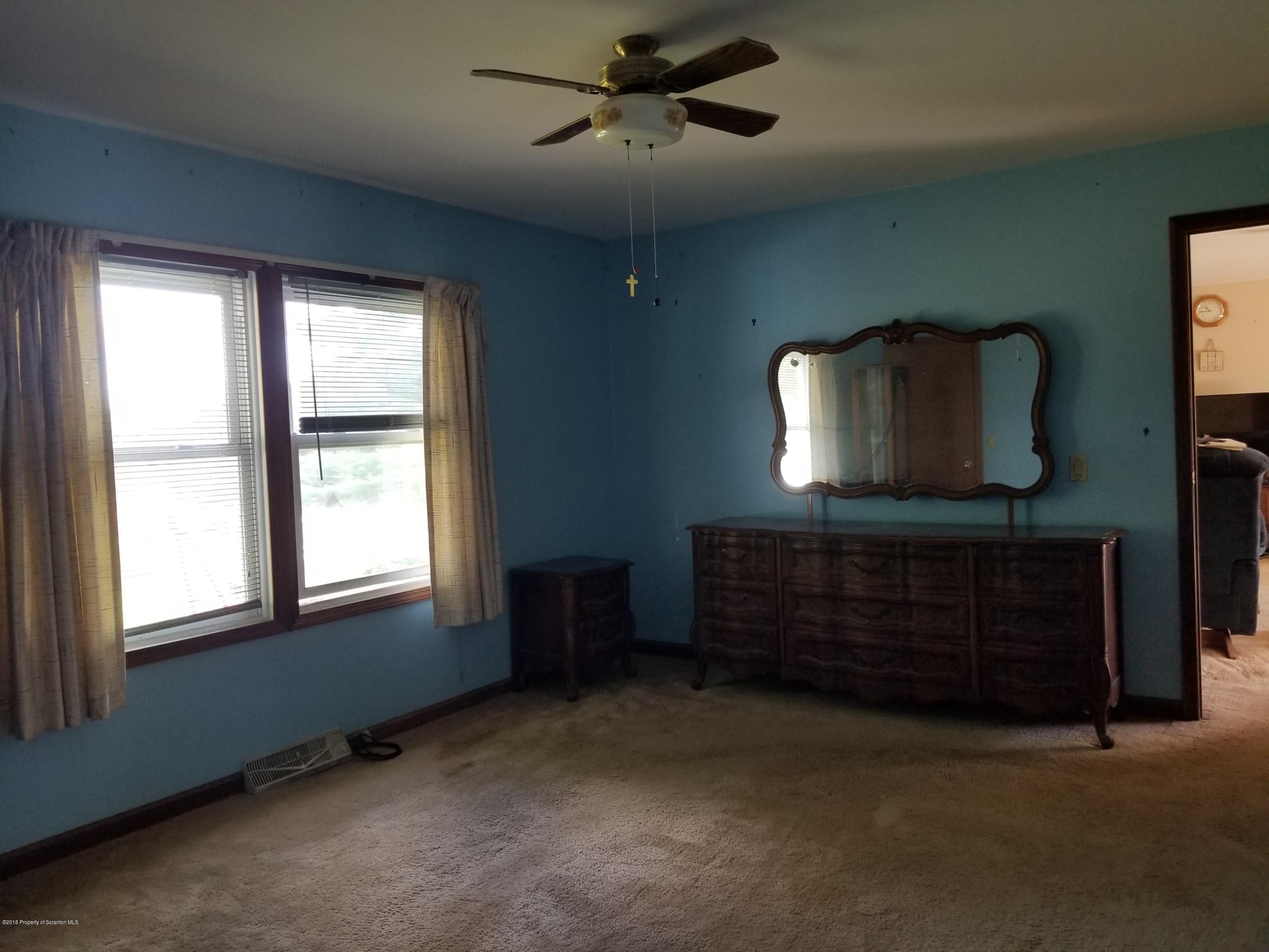 1774 State Rte 2004 Nicholson, PA 18446 - Photo 5 of 9 a room with furniture and a dresser