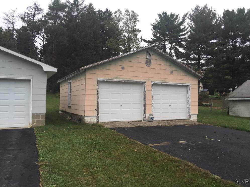 485 Sportsman Club Road Nazareth, PA 18064 - Photo 2 of 9 a view of a house with a yard and garage