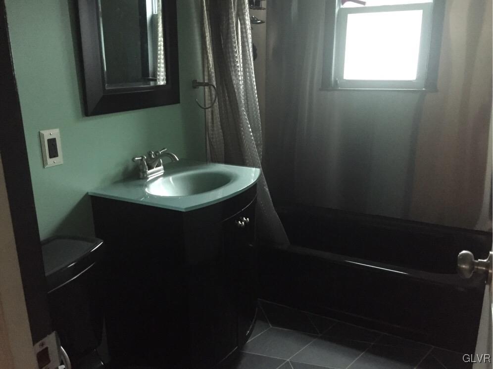 485 Sportsman Club Road Nazareth, PA 18064 - Photo 6 of 9 a bathroom with a sink toilet and vanity