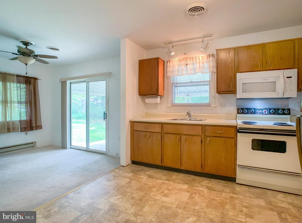 26 Augusta Road Whiting, NJ 08759 - Photo 6 of 16 Kitchen and Den