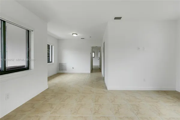 a view of a hallway with entryway
