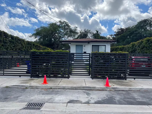 a view of house with a street