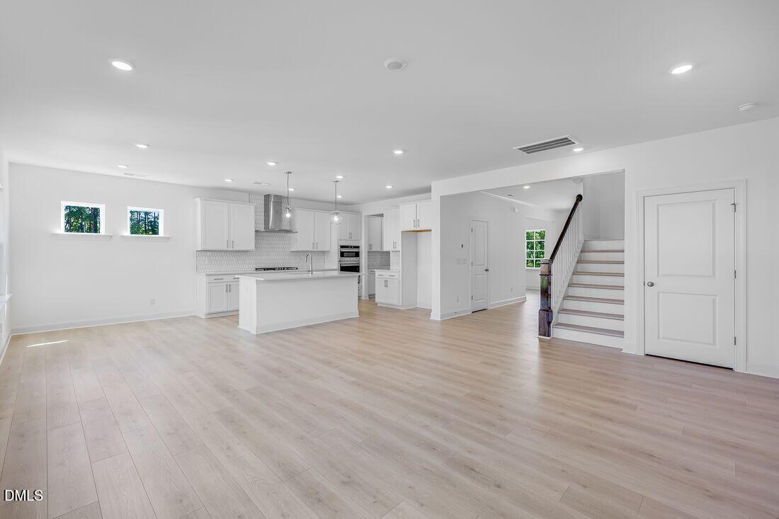 147 Rivulet Court Cary, NC 27519 - Photo 5 of 35 sheridan-tvloungetokitchen