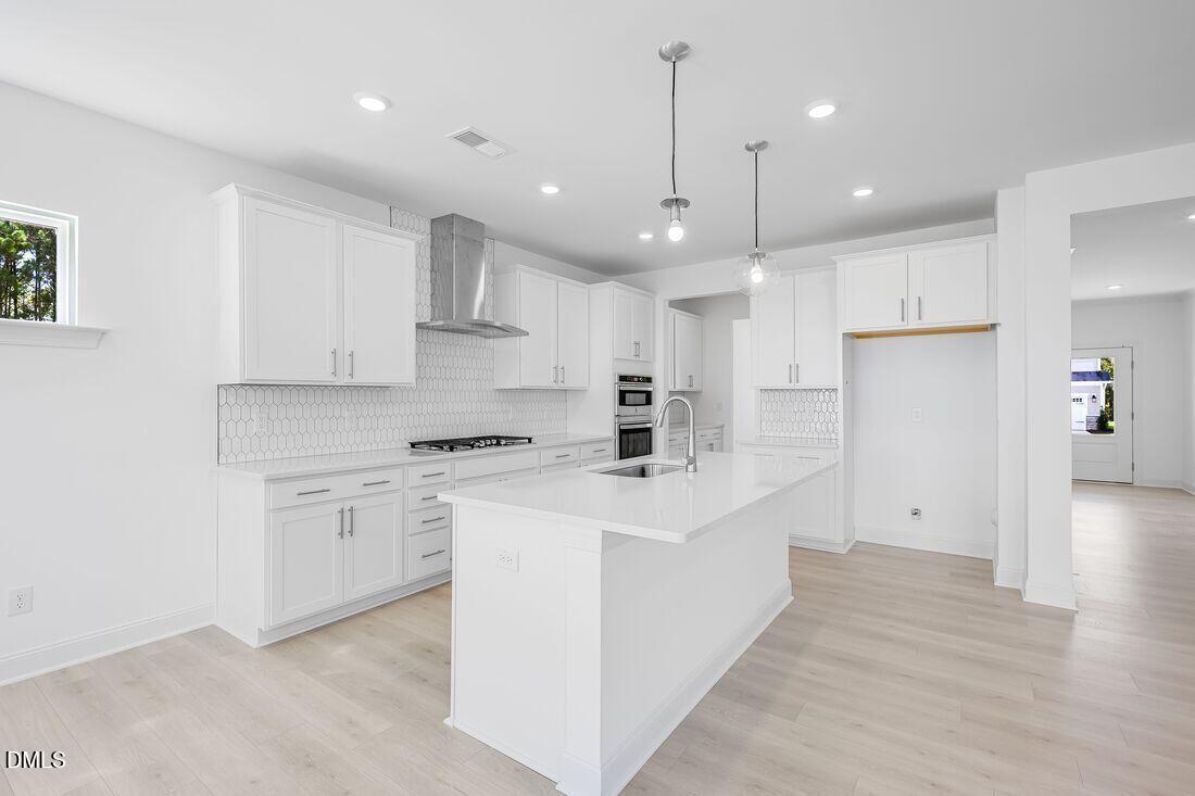 147 Rivulet Court Cary, NC 27519 - Photo 10 of 35 sheridan-kitchen