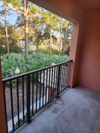 a view of a porch with a yard