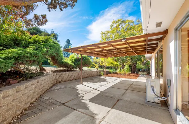 a garden view with a seating space