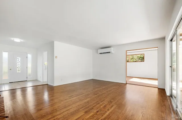 a kitchen with stainless steel appliances granite countertop a sink and a stove