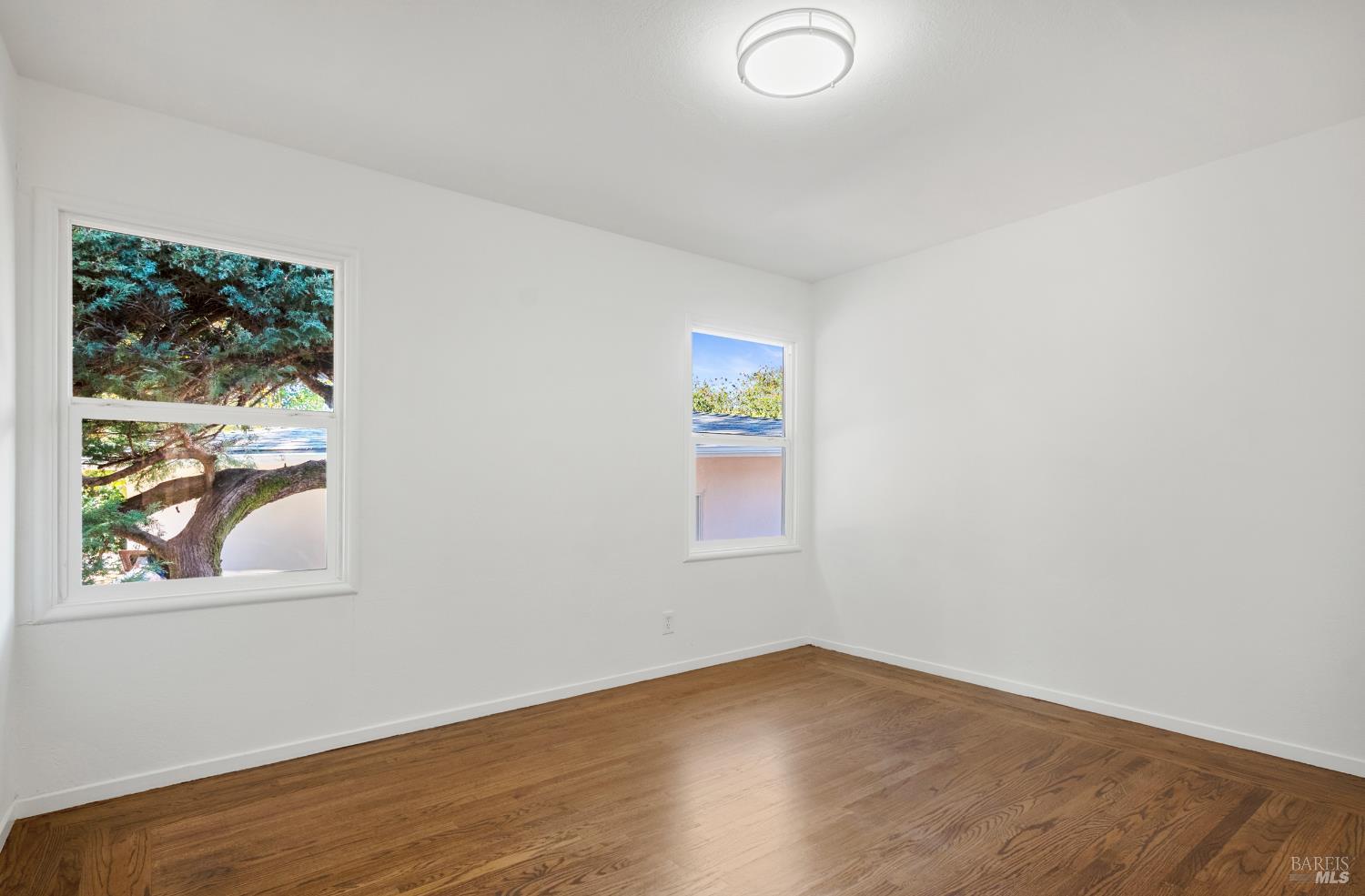 23 Valley View Court El Sobrante, CA 94803 - Photo 27 of 69 Bedroom 2 with windows toward yard and garage, patio.