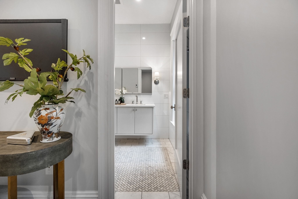 82 Worcester Street, Unit 2 Boston, MA 02118 - Photo 20 of 32 a view of kitchen with furniture and a potted plant