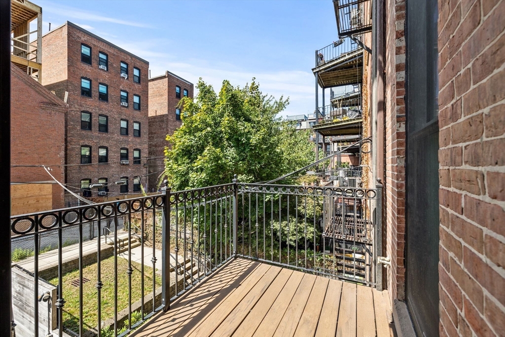 82 Worcester Street, Unit 2 Boston, MA 02118 - Photo 28 of 32 a view of balcony with a potted plant