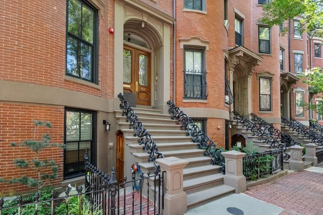 a front view of a multi story residential apartment building