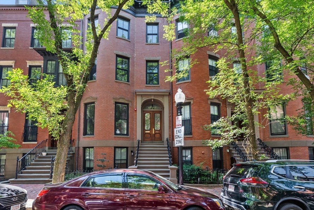 82 Worcester Street, Unit 2 Boston, MA 02118 - Photo 31 of 32 a front view of a building with garden