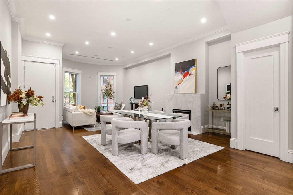 82 Worcester Street, Unit 2 Boston, MA 02118 - Photo 5 of 32 a living room with lots of furniture and a view of kitchen