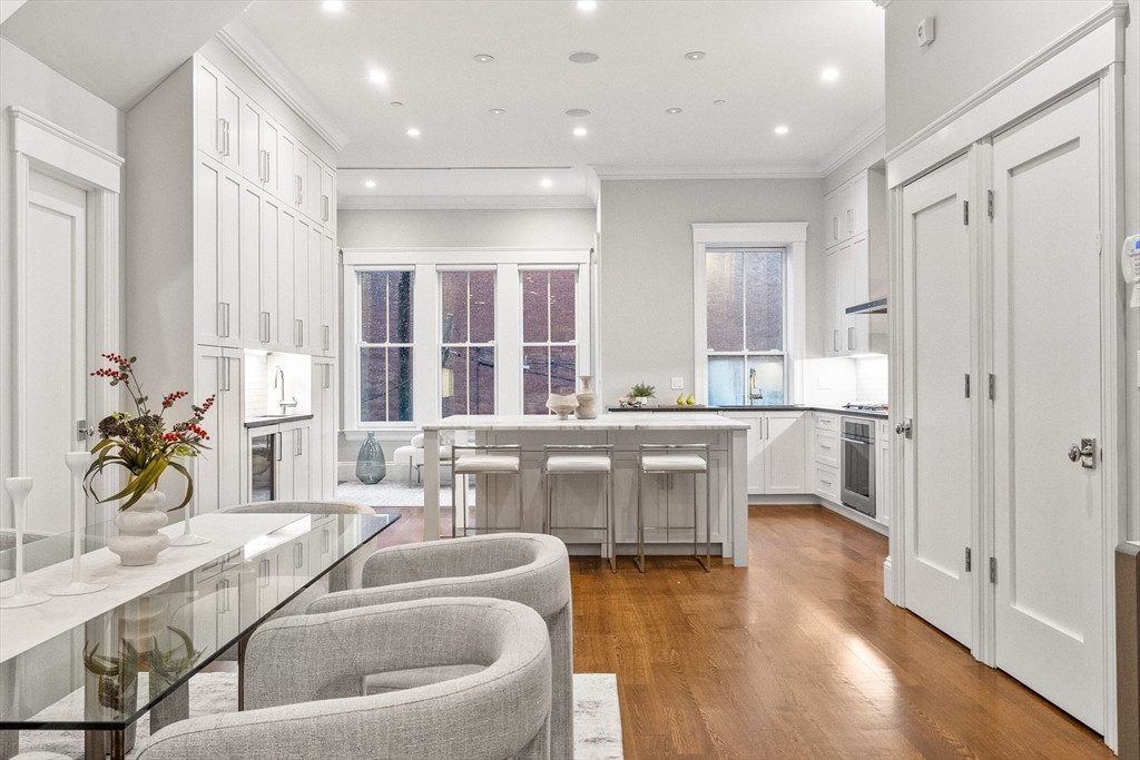 82 Worcester Street, Unit 2 Boston, MA 02118 - Photo 8 of 32 a living room with furniture and wooden floor