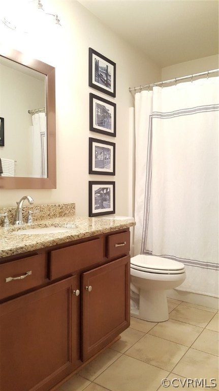 11437 Chester Road Chester, VA 23831 - Photo 8 of 25 a bathroom with a granite countertop sink toilet and mirror