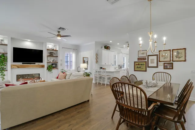 a bedroom with a bed and a chair in it