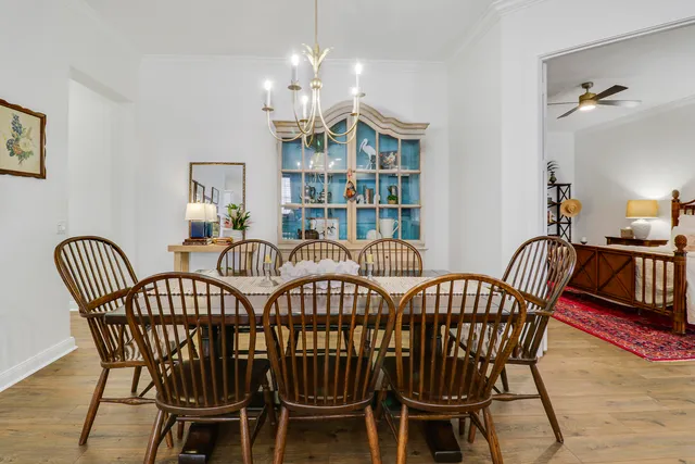 a living room with furniture and a lamp