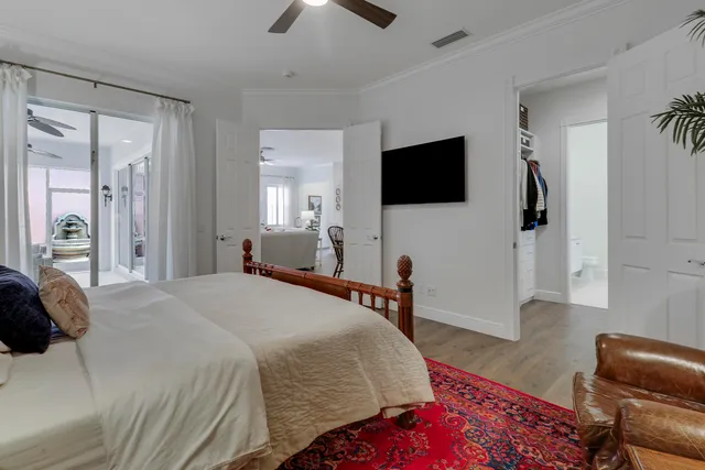 a view of a porch with furniture and garden