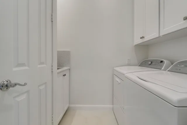 a front view of a house with a yard and porch