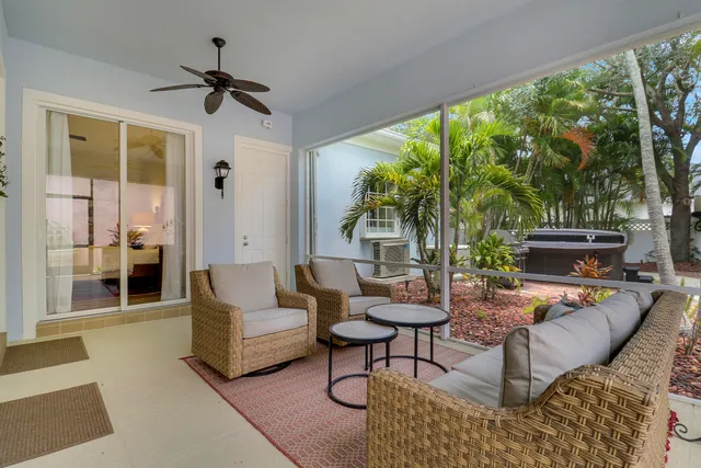 an aerial view of a residential apartment building with a yard