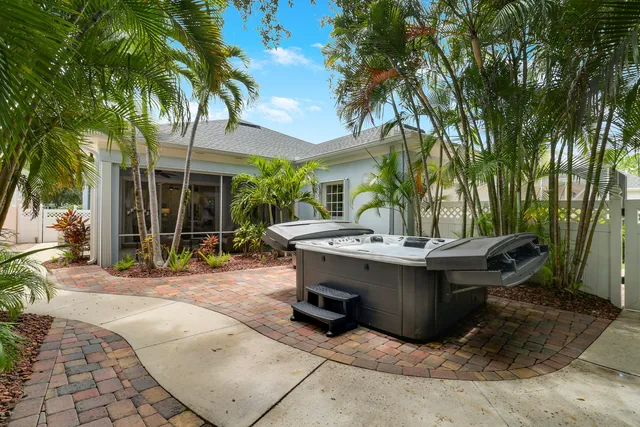 an aerial view of residential houses with city view
