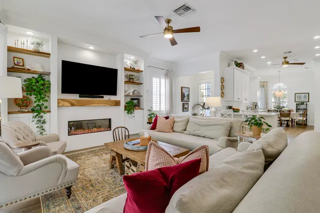 a kitchen with sink cabinets and dining table