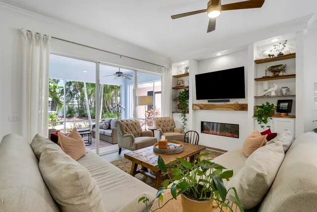 a kitchen with stainless steel appliances and white cabinets