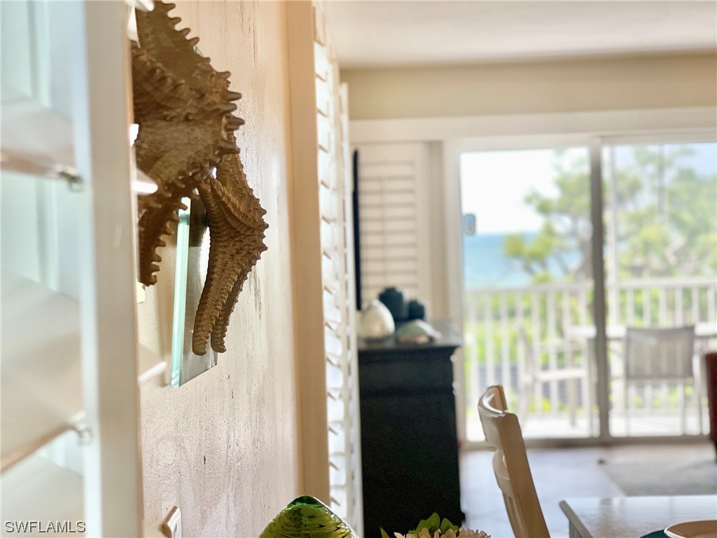 2521 Beach Villas Captiva, FL 33924 - Photo 21 of 50 a very nice looking room with a large window and front door