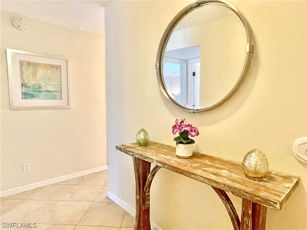 2521 Beach Villas Captiva, FL 33924 - Photo 23 of 50 a bathroom with a sink mirror and a mirror