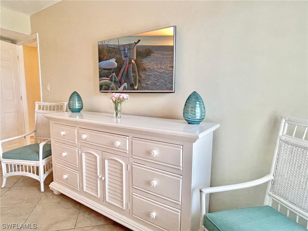 2521 Beach Villas Captiva, FL 33924 - Photo 28 of 50 a bathroom with a granite countertop toilet sink and mirror