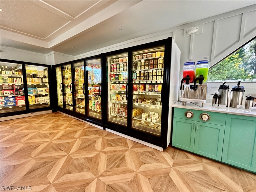 2521 Beach Villas Captiva, FL 33924 - Photo 47 of 50 a bedroom with a bed and a large window