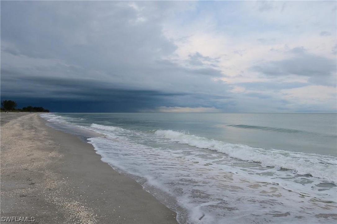 2521 Beach Villas Captiva, FL 33924 - Photo 49 of 50 a view of empty room with wooden floor