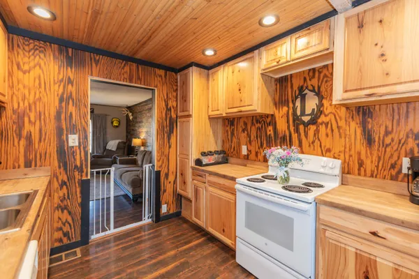 a kitchen with a stove and a refrigerator