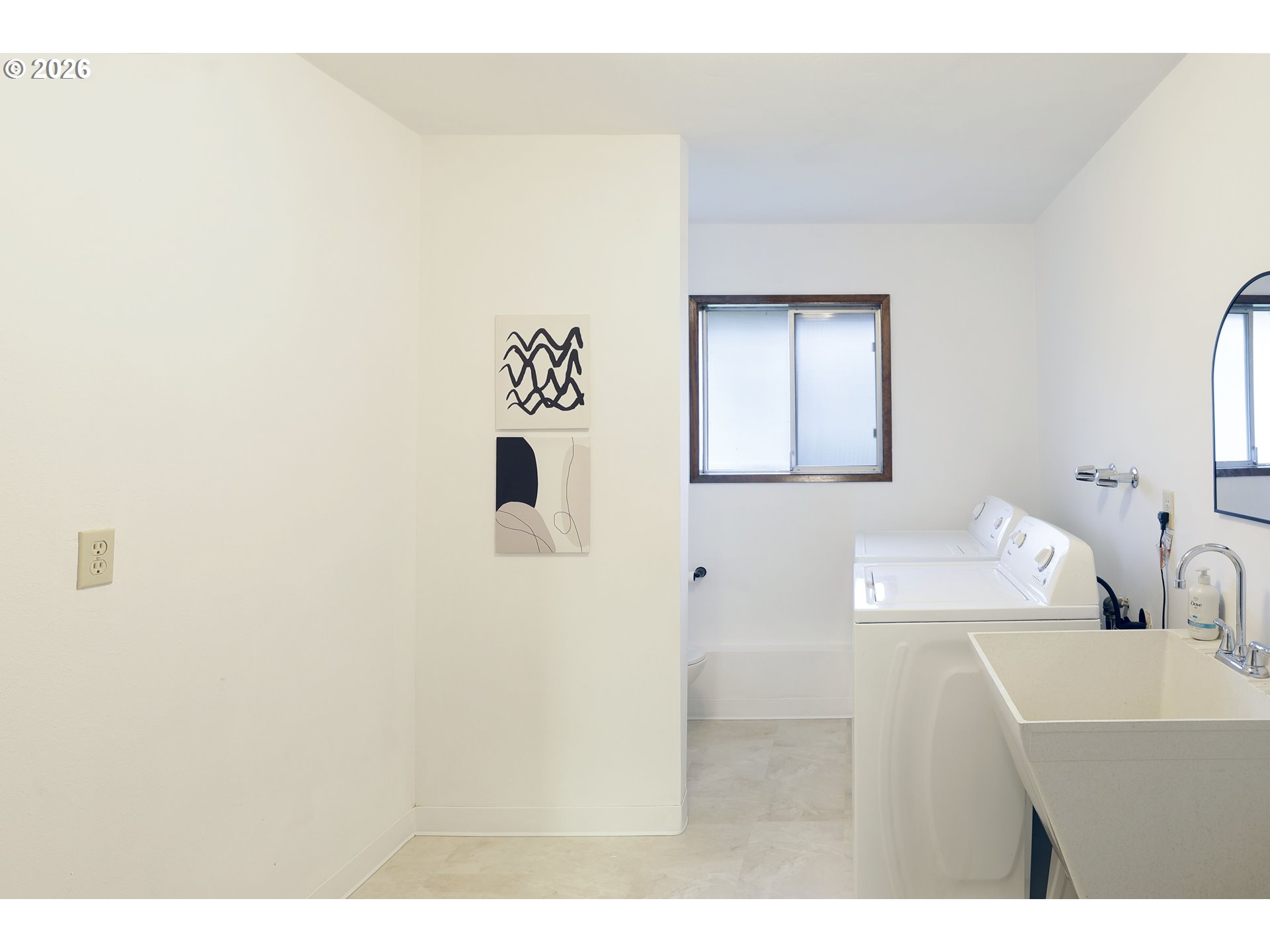 16285 Southwest Rosa Road Beaverton, OR 97007 - Photo 15 of 20 a bathroom with a sink and a mirror