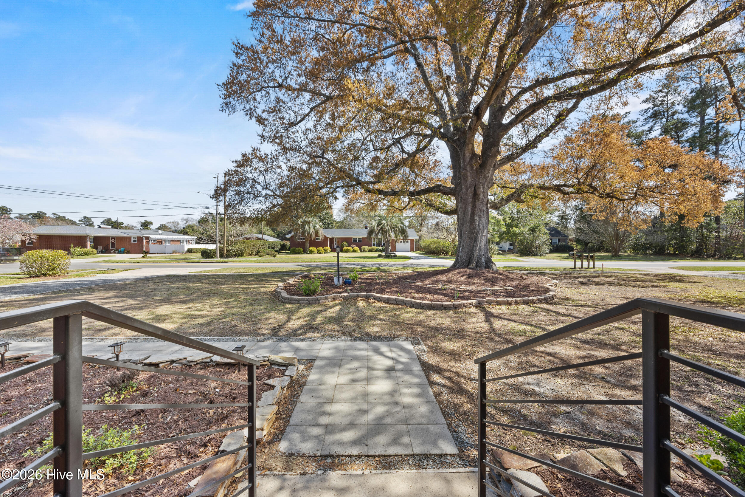 1702 Lincoln Road Wilmington, NC 28403 - Photo 8 of 45 Front porch railing