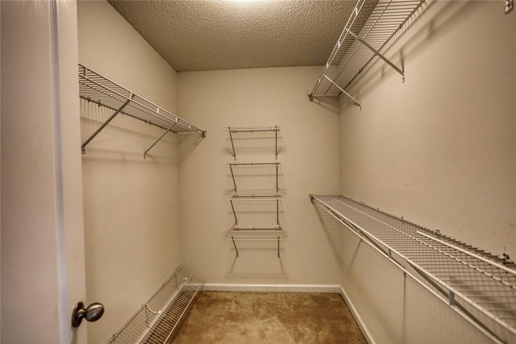 1916 Brenda Street Statham, GA 30666 - Photo 16 of 21 a view of walk in closet