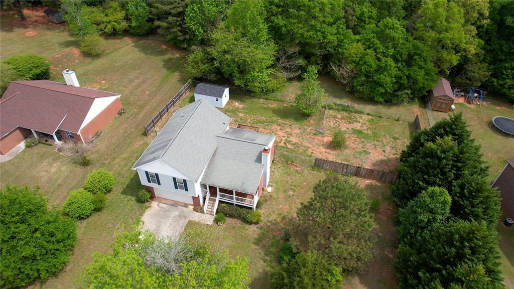 1916 Brenda Street Statham, GA 30666 - Photo 3 of 21 an aerial view of house with yard swimming pool and outdoor seating