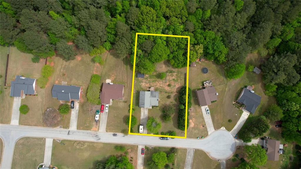 1916 Brenda Street Statham, GA 30666 - Photo 4 of 21 aerial view of a house with a garden