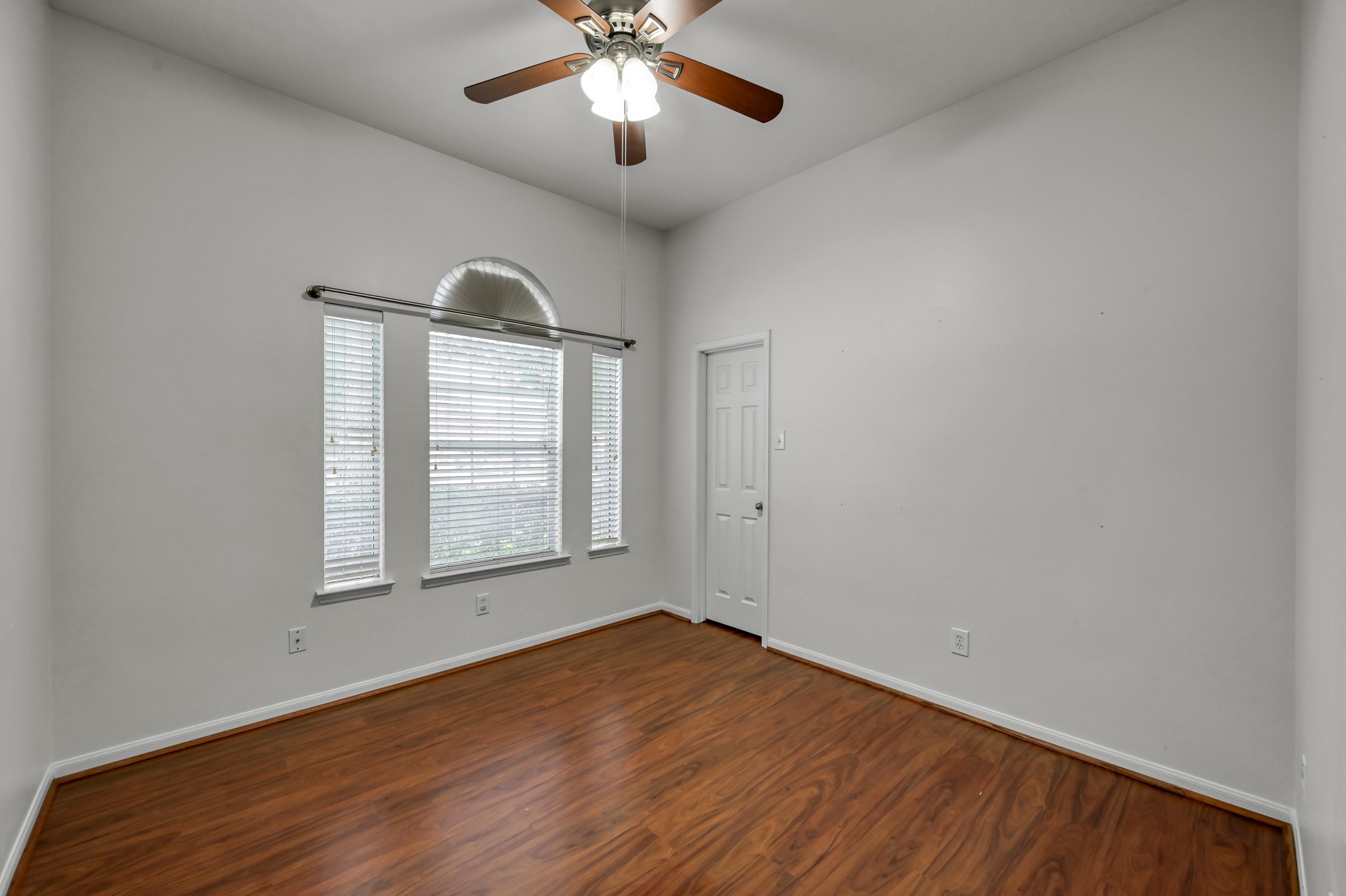 21331 Timber Pines Drive Spring, TX 77388 - Photo 18 of 22 This room has a charming set of windows with a moon window, perfect for nights of dreaming of the stars at night!