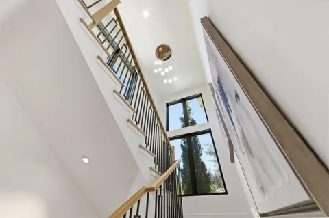 a bathroom with a glass shower door