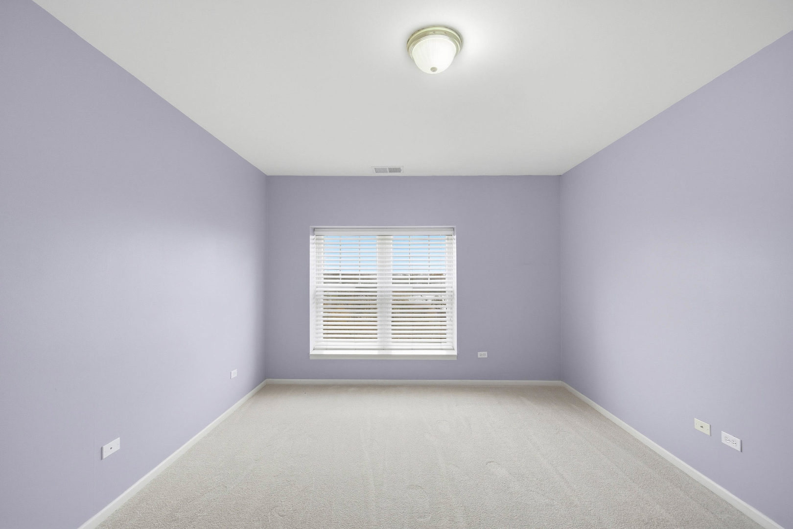 390 West Mahogany Court, Unit 606 Palatine, IL 60067 - Photo 14 of 27 an empty room with a window