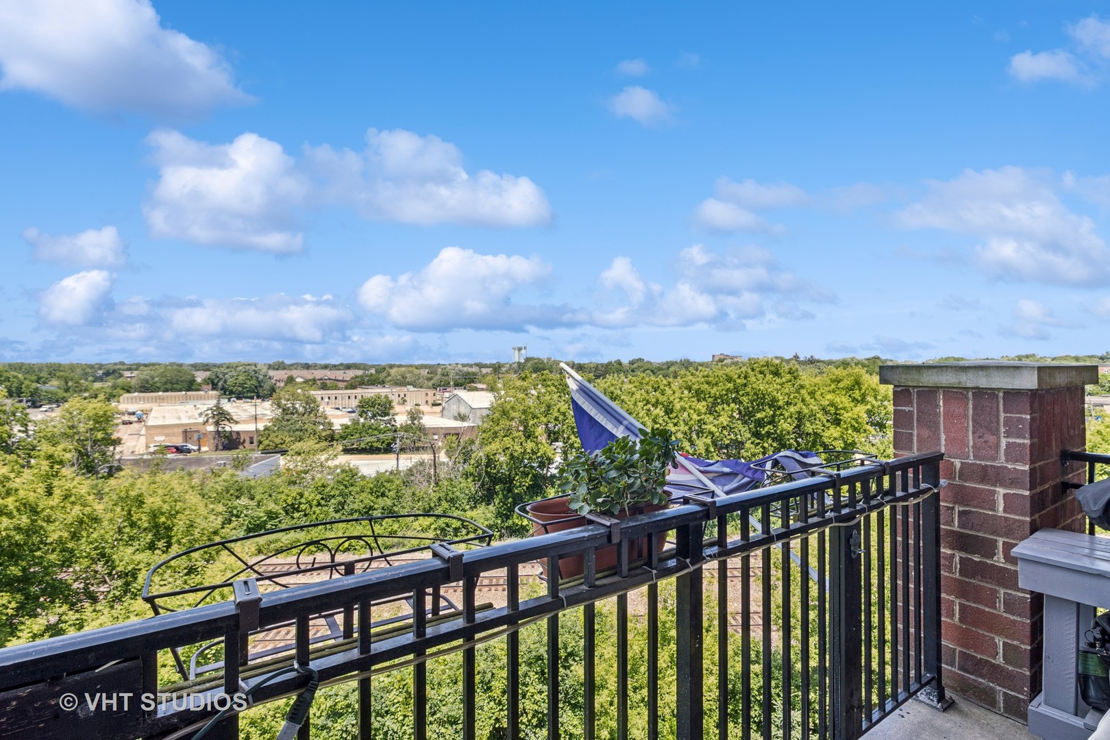 390 West Mahogany Court, Unit 606 Palatine, IL 60067 - Photo 22 of 27 a city view from a balcony
