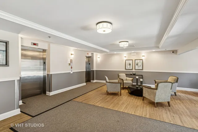 front view of a brick house with a small yard